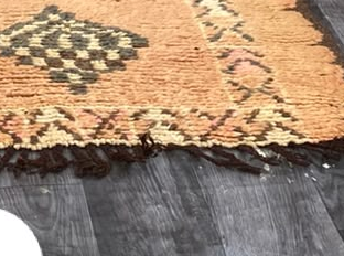 Fringe and edge detail of Apricot Vintage Moroccan Rug with Black Diamonds and Symbols, 273 × 163 cm.