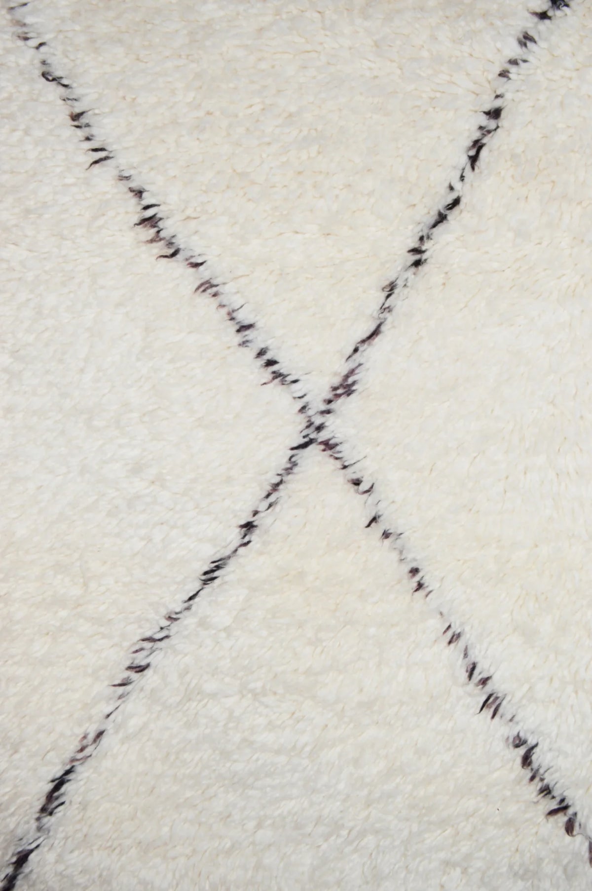 Beni Ourain wool rug, cream ground with several black diagonal lines, product view 3