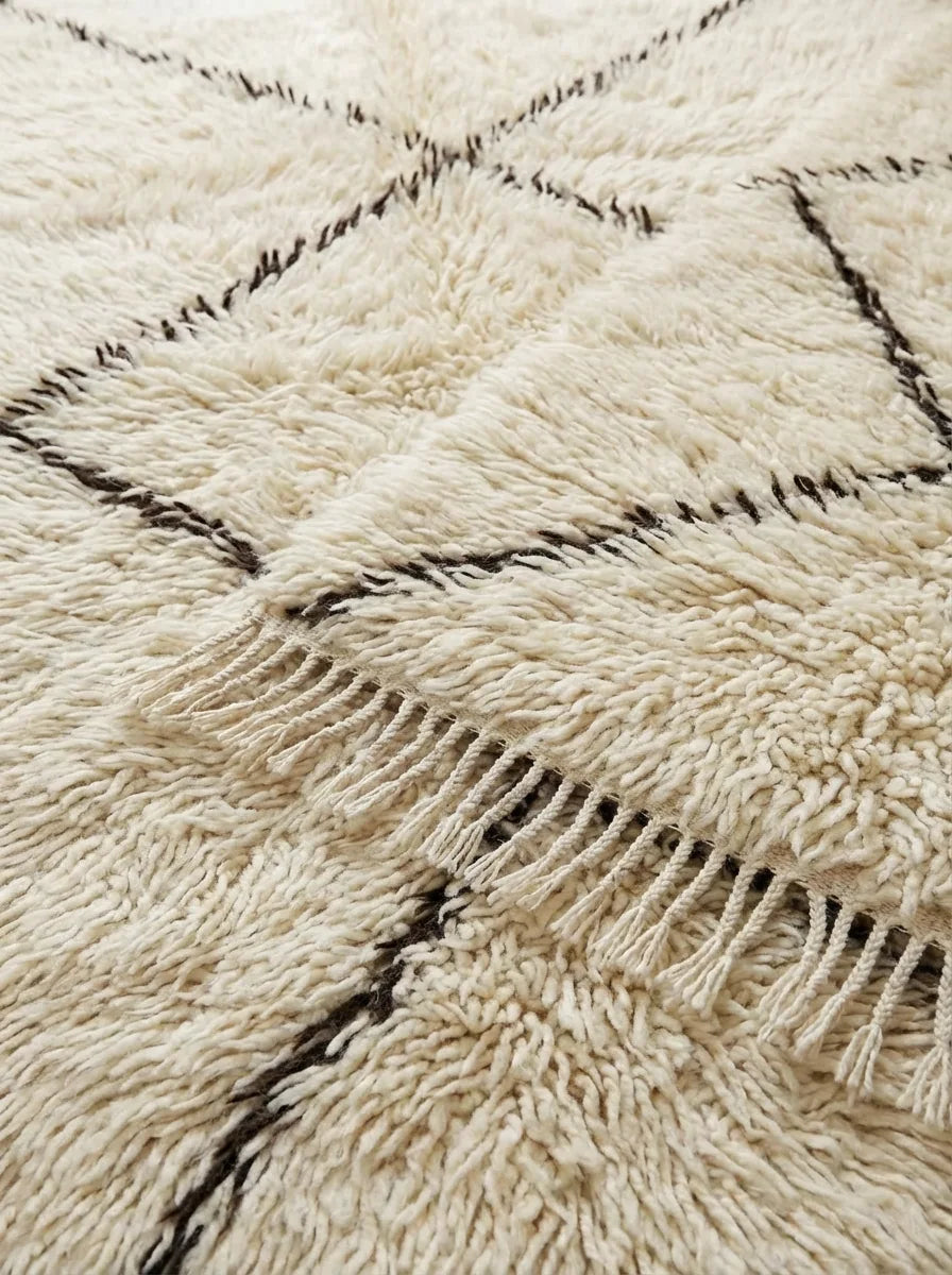 Moroccan wool rug, cream ground with a large dark center diamond, product view 4