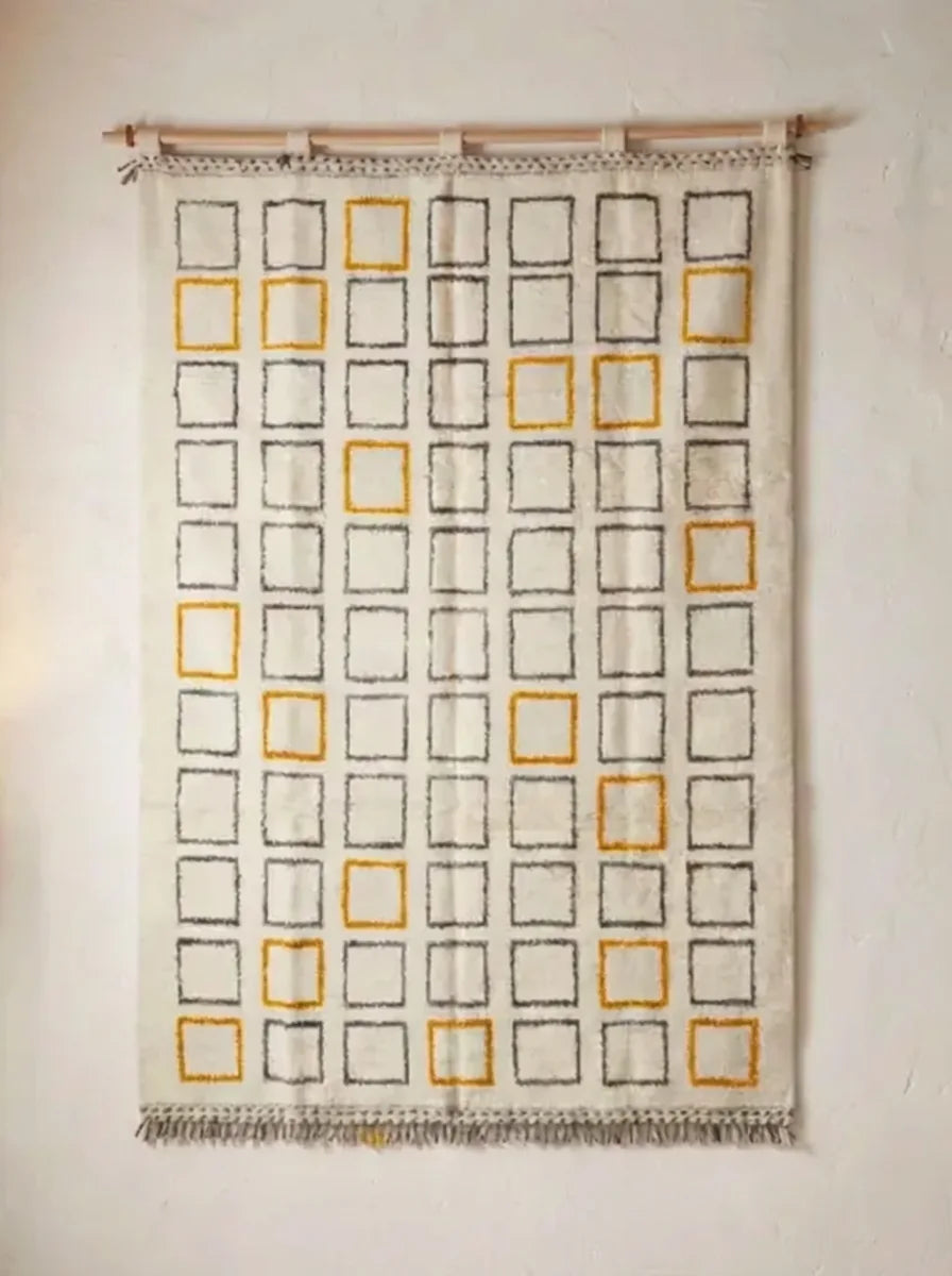 Moroccan wool rug, cream ground with brown rows of rectangles and yellow accents, product view 2