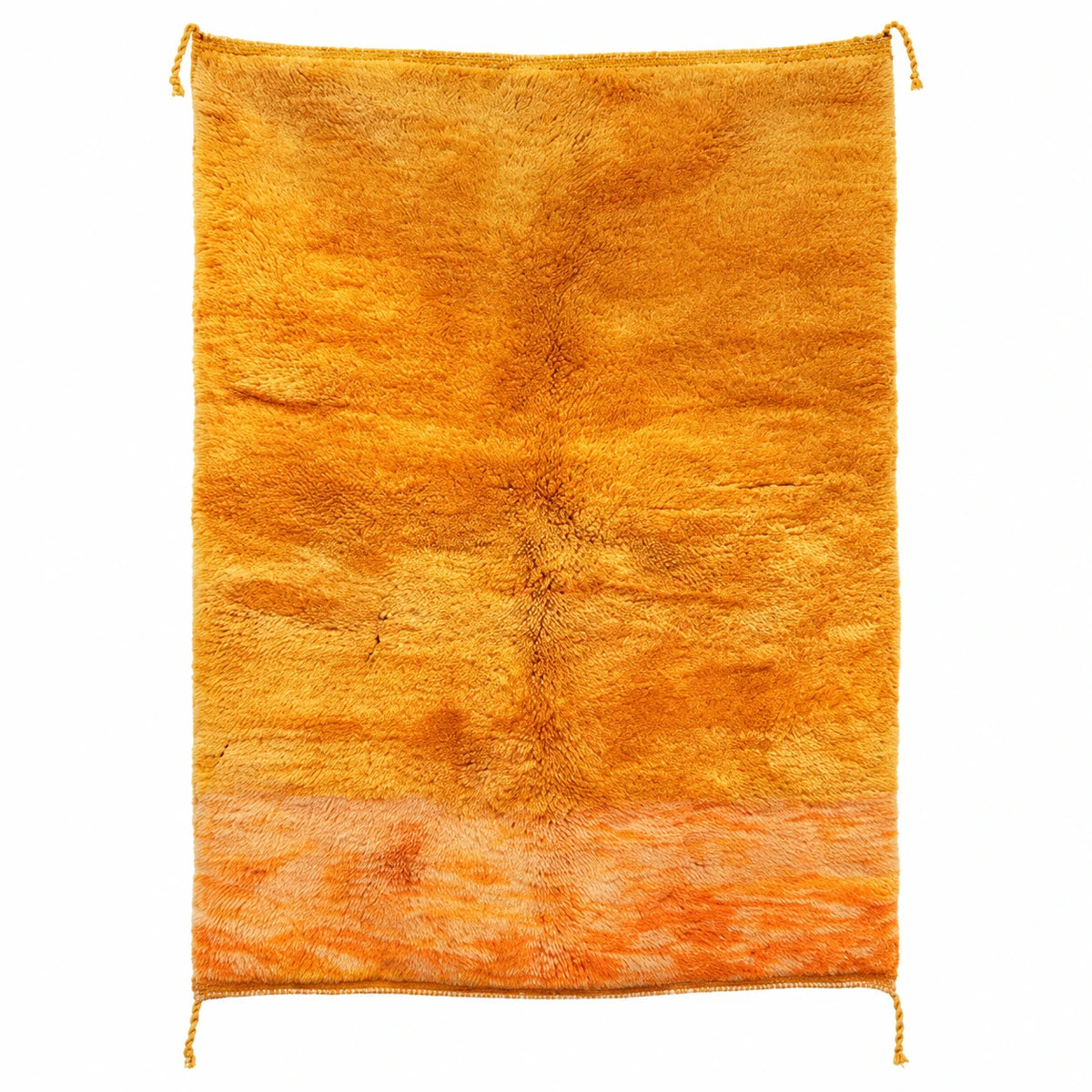 Front view of Moroccan wool rug, rich golden orange ground with a varied color texture