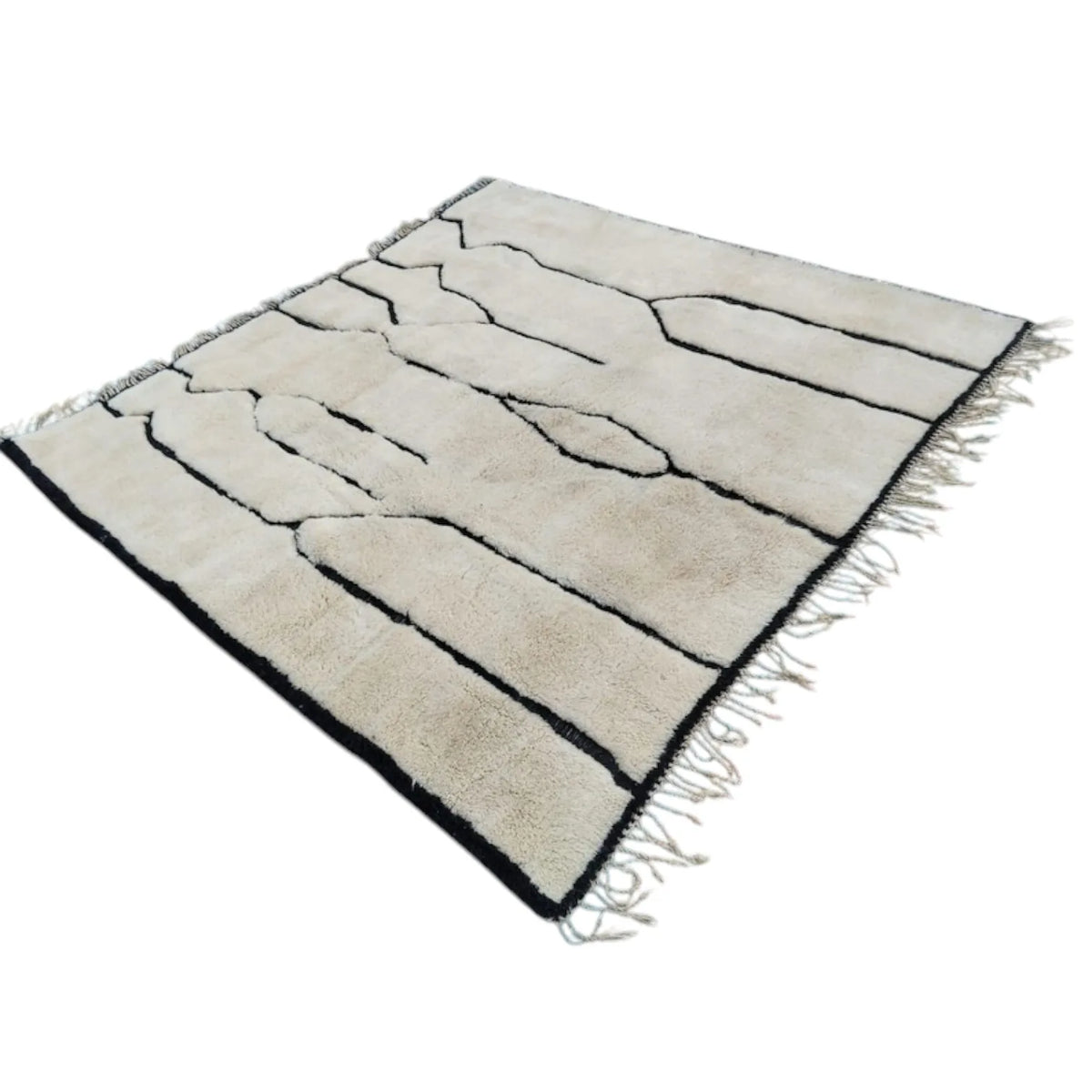 Moroccan wool rug, cream ground with black vertical lines and narrow diamonds, product view 3