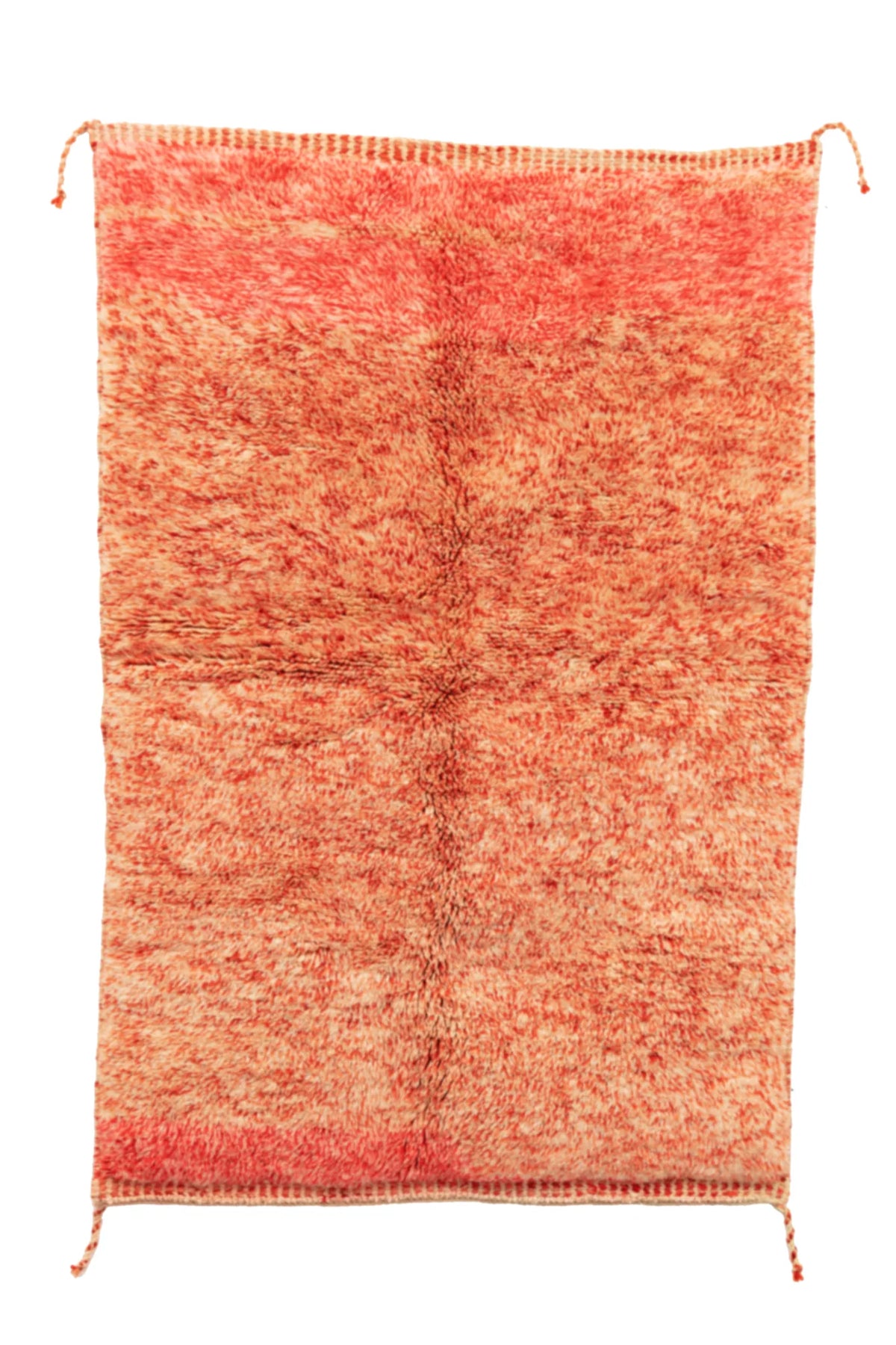Detail of Moroccan wool rug, red ground with a lighter mottled texture