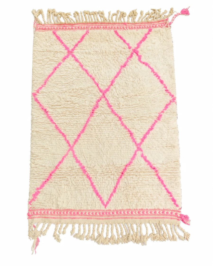 Front view of Mrirt wool rug, cream ground with a pink diamond pattern