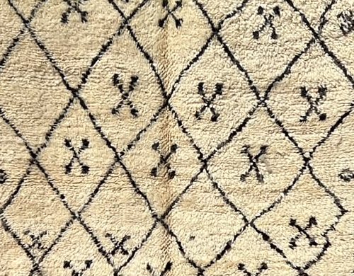 Detail of Cream Beni Ourain Rug with Diamonds and Small Symbols, 250 × 170 cm.