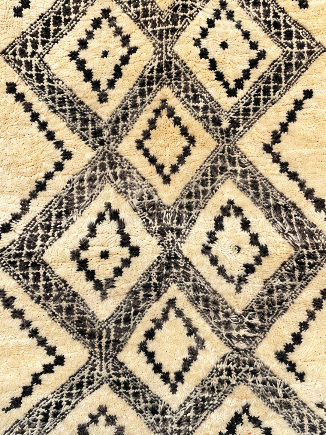 Detail of Black and Cream Vintage Moroccan Rug with Diamonds, 330 × 160 cm.